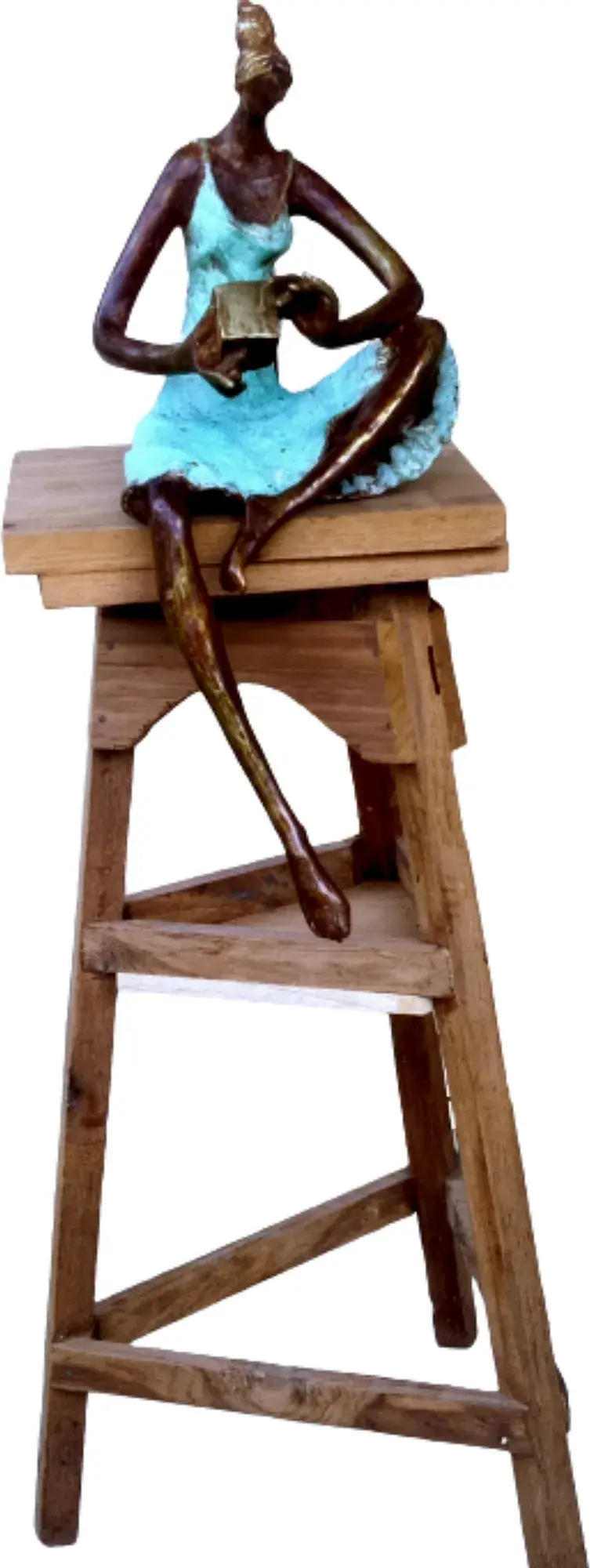 An Object Study — a bronze seated girl in a mint-green dress on a wooden stool, holding a small object