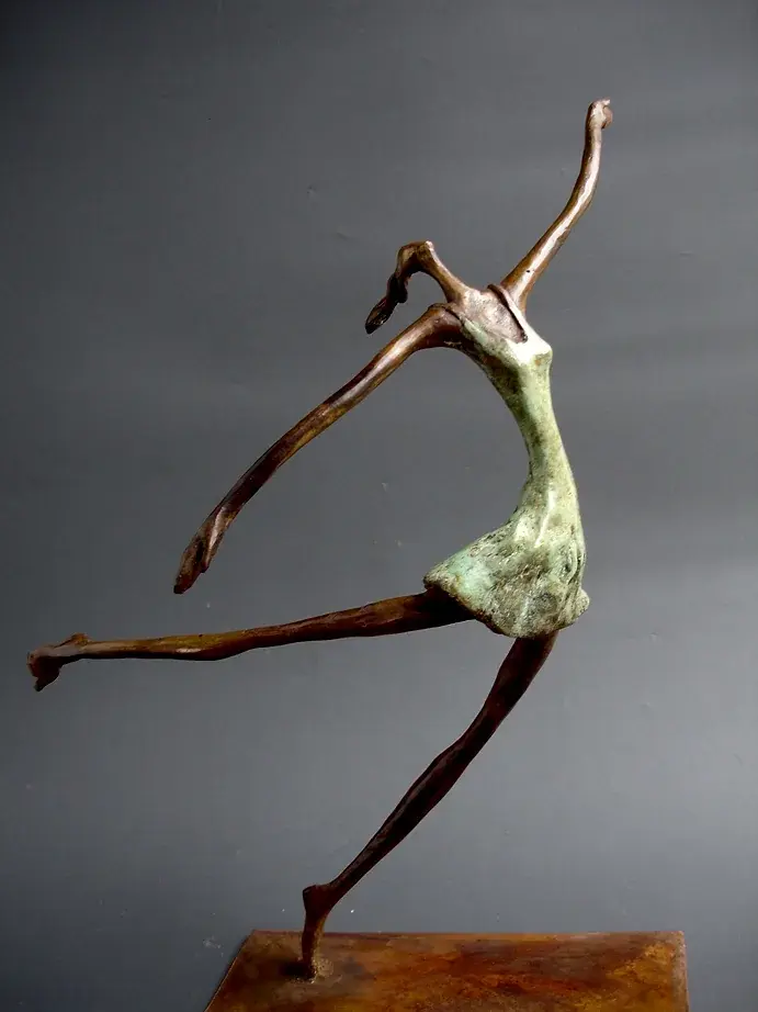 Bronze dancing figure leaping with one leg forward, arms diagonal, on a rectangular base